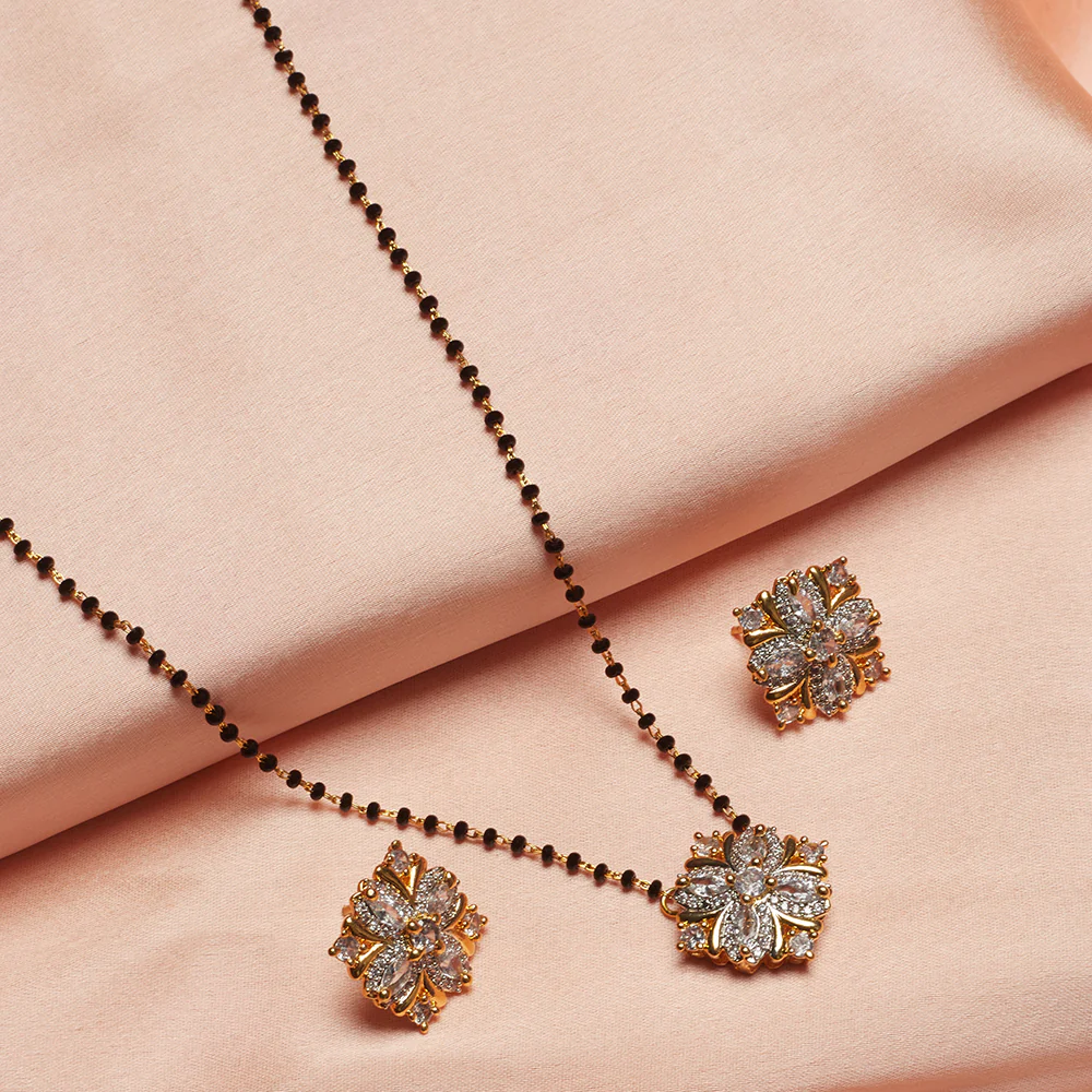 Shimmering Floret American Diamond CZ Gold Plated Brass Black Beaded Mangalsutra with Earrings