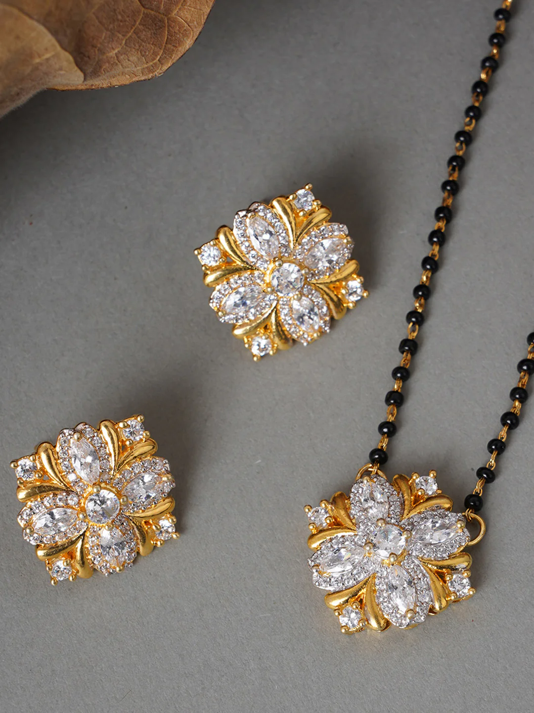 Shimmering Floret American Diamond CZ Gold Plated Brass Black Beaded Mangalsutra with Earrings - Image 6