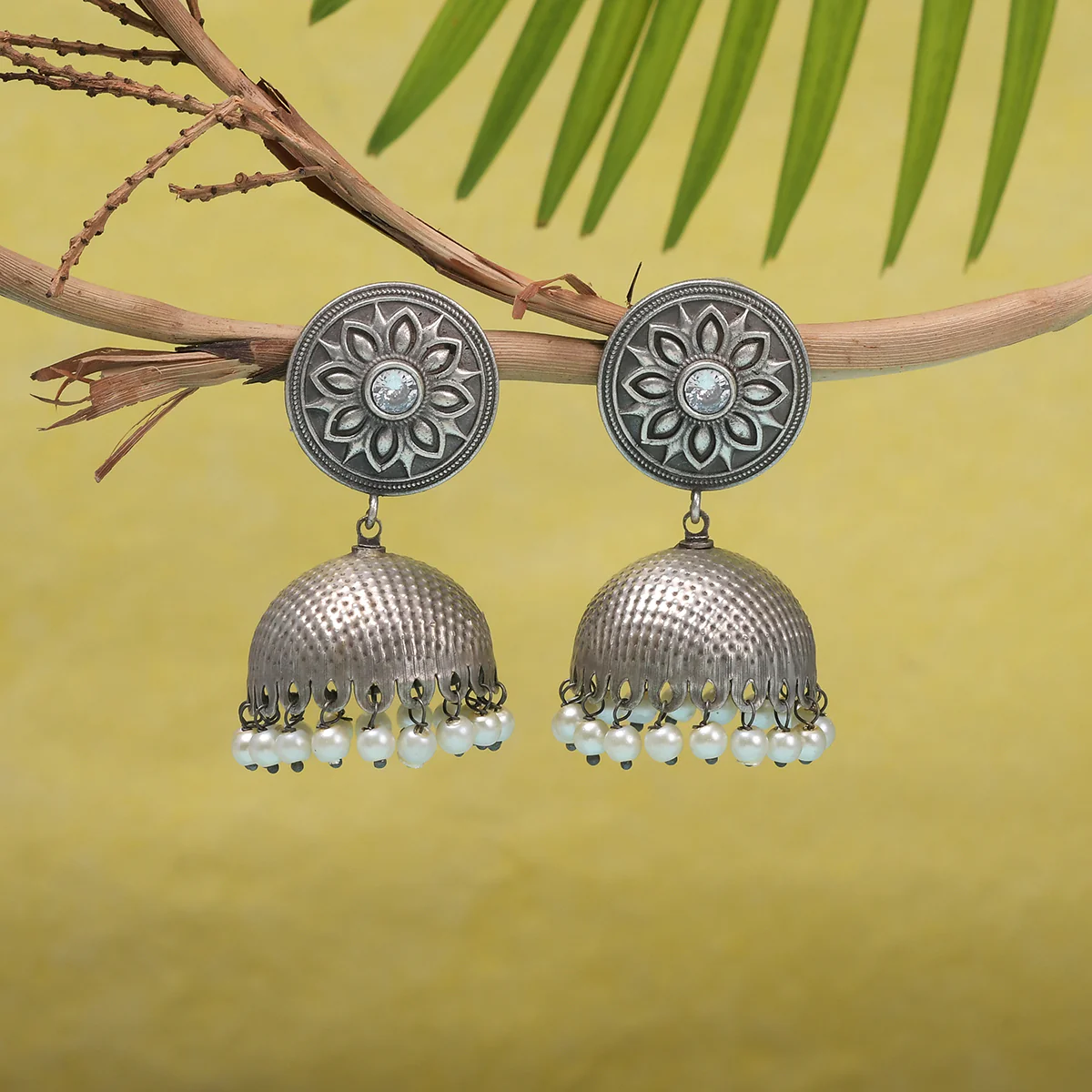 Antique Elegance Floral Motif Faux Pearls Brass Silver Plated Jhumka Earrings