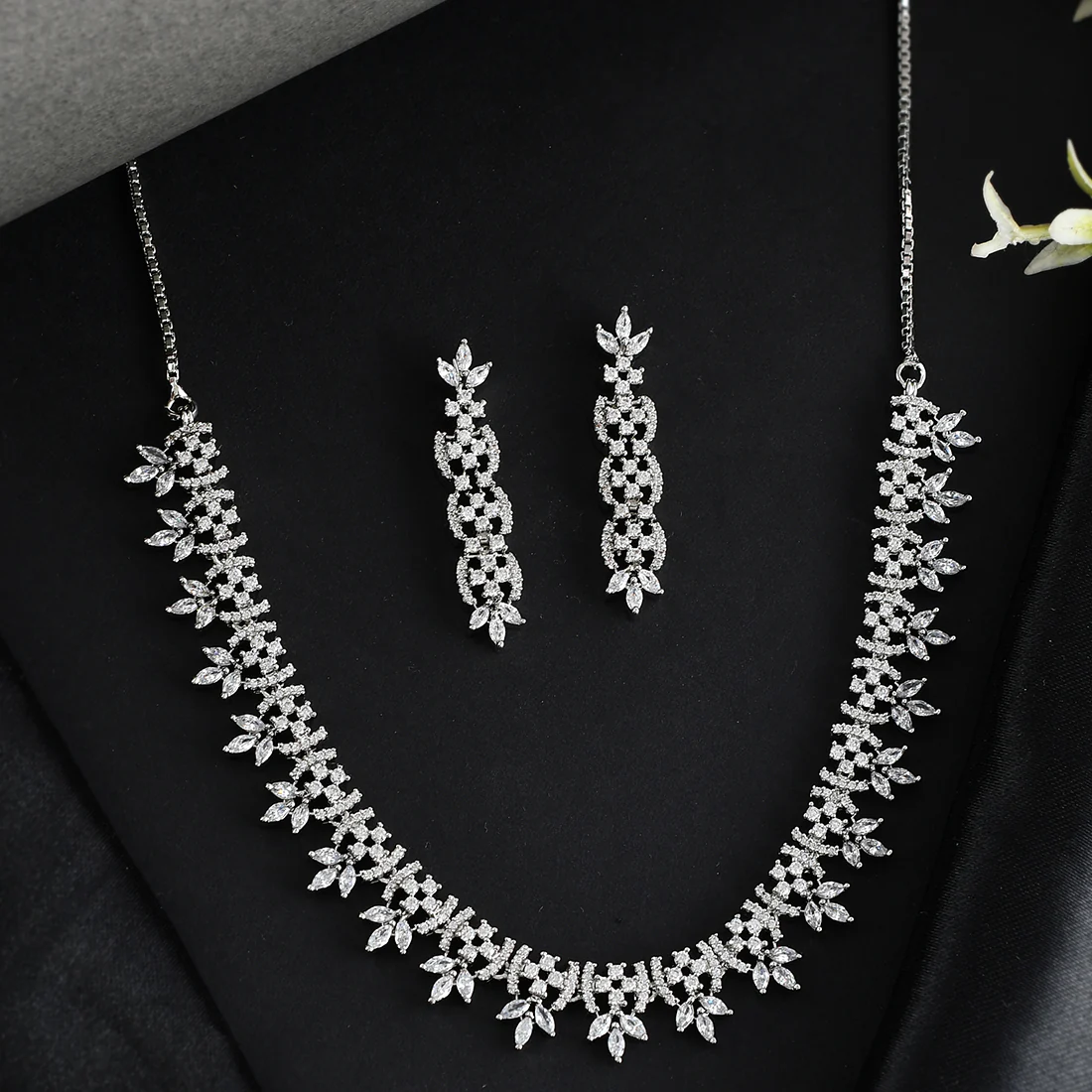 Cz Elegance Silver Plated Brass Made Leafy Necklace And Earrings