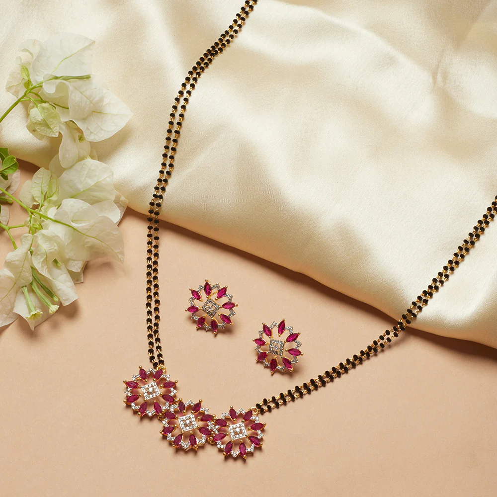 Shimmering Floret American Diamond CZ Gold Plated Brass Black Beaded Mangalsutra with and Red Studs