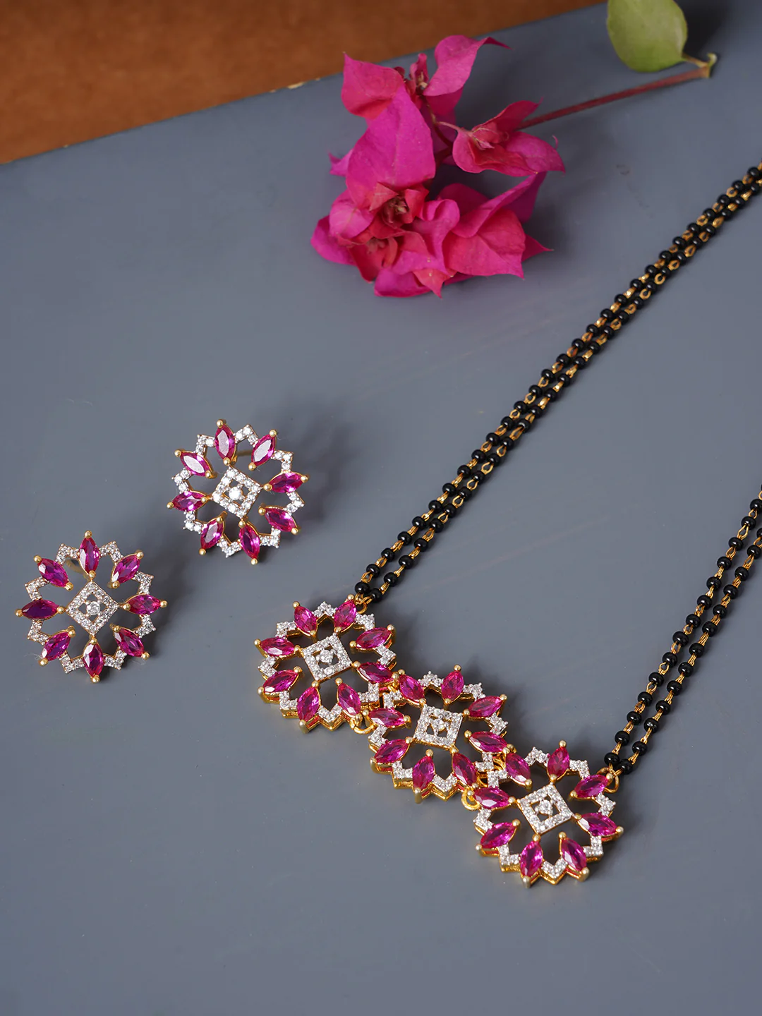 Shimmering Floret American Diamond CZ Gold Plated Brass Black Beaded Mangalsutra with and Red Studs - Image 6