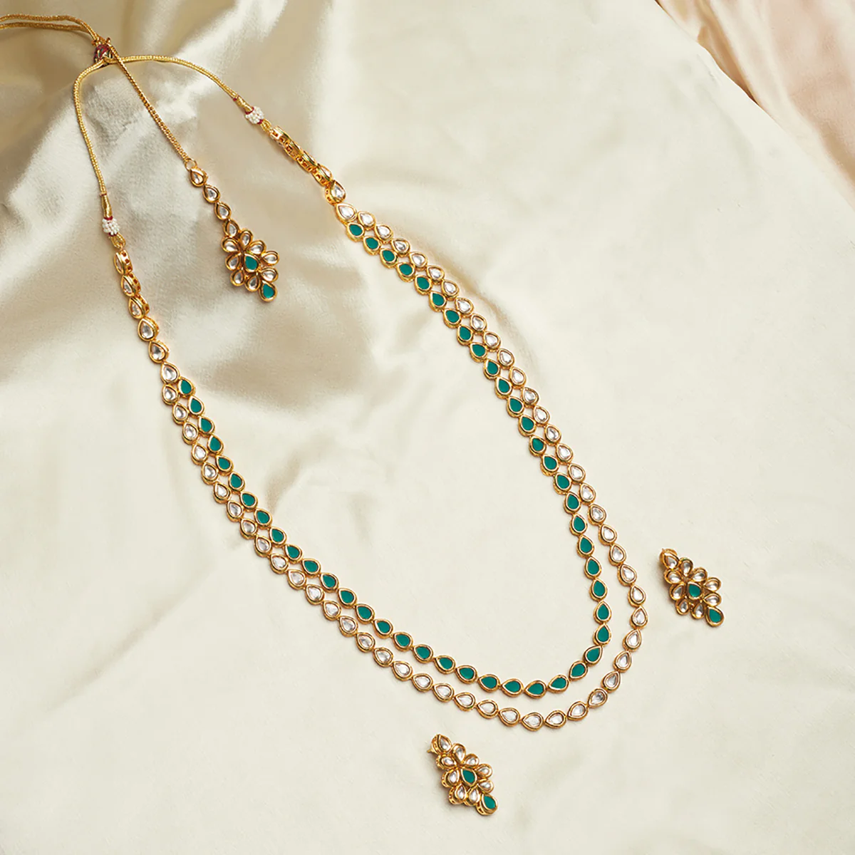 Double Layered Kundan Maang Tika Set With Green Beads