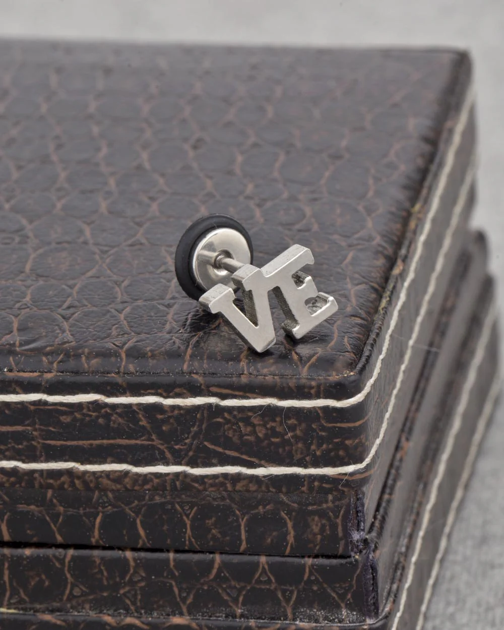 Dual Tone Alphabet Stud Out Earring