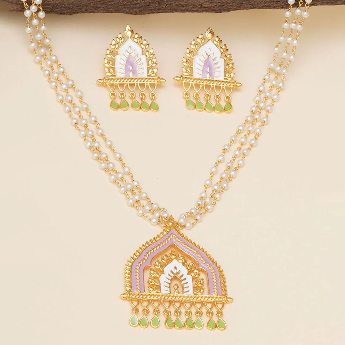 Festive Hues Pearls Adorned Gold Plated Temple Jewellery Set