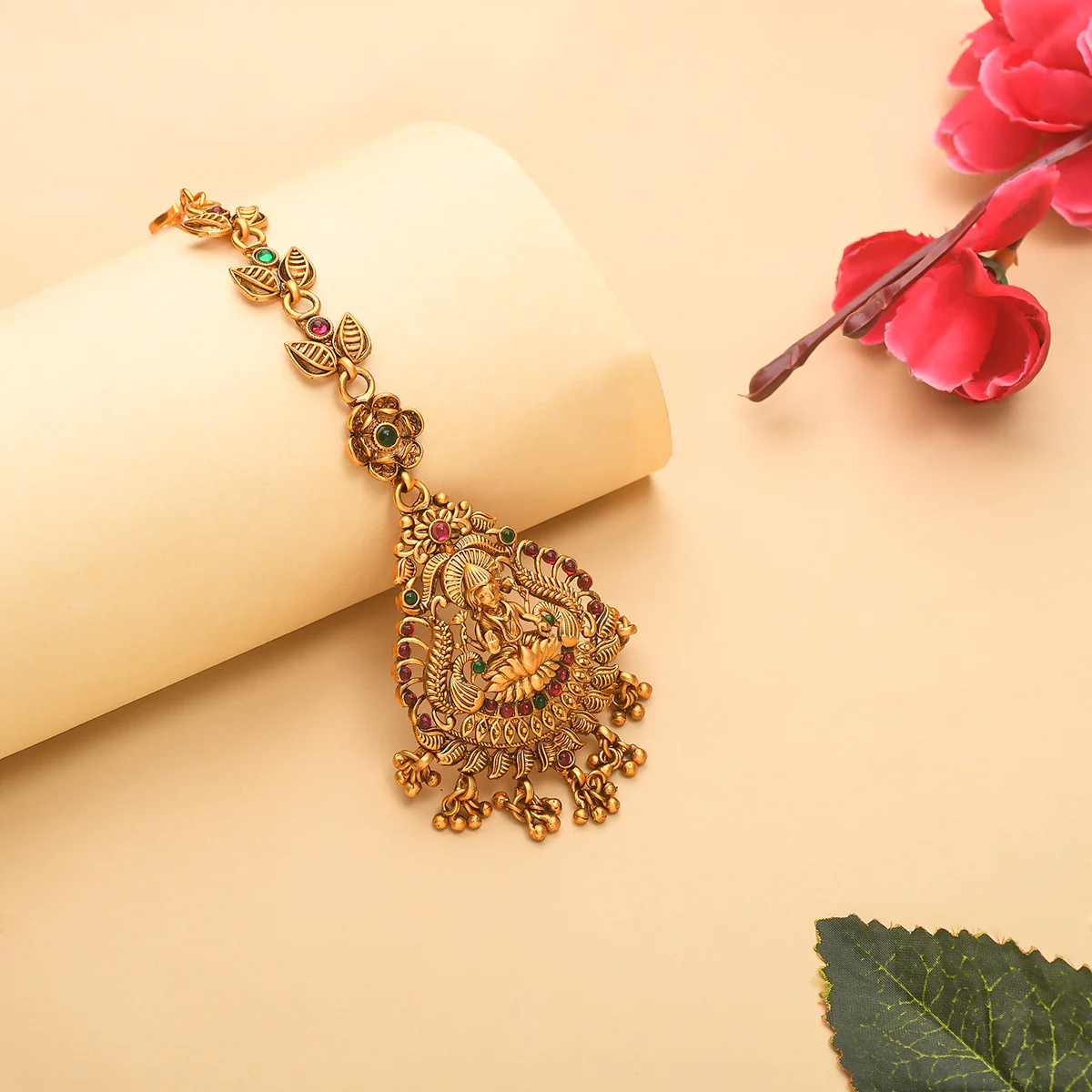 Floral Inspired Motifs Brass Goddess Lakshmi Gold Toned Maang Tika