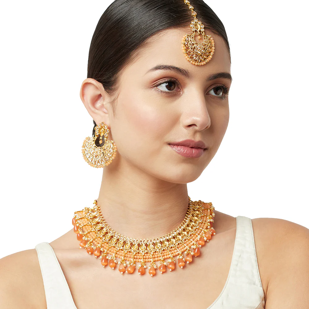 Gold finish mang tika set with peach colour pearls and gold finish - Image 2