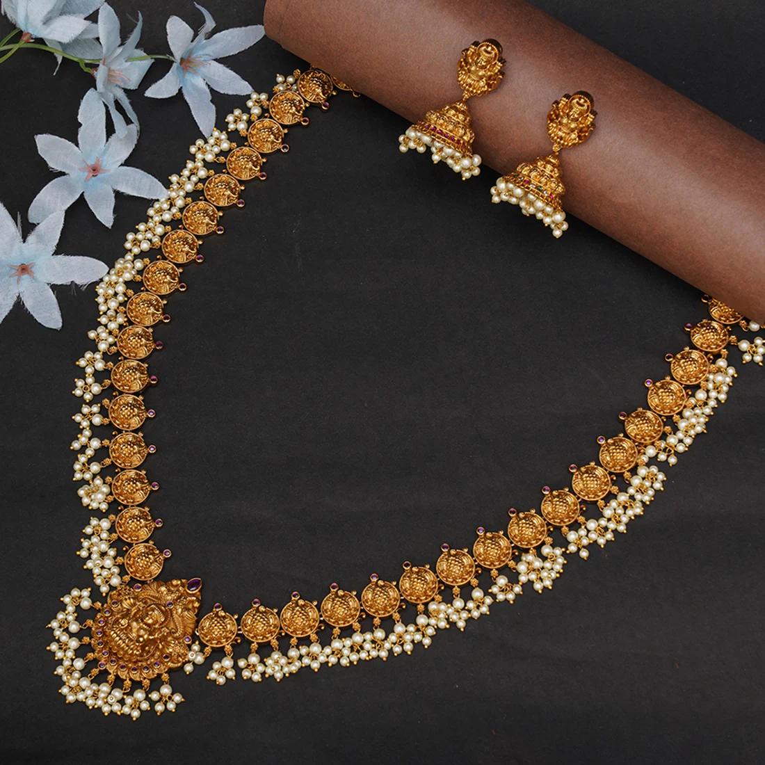 Gold Opulence Goddess Lakshmi Motif Faux Pearls and Zircons Adorned Gold Plated Jewellery Set