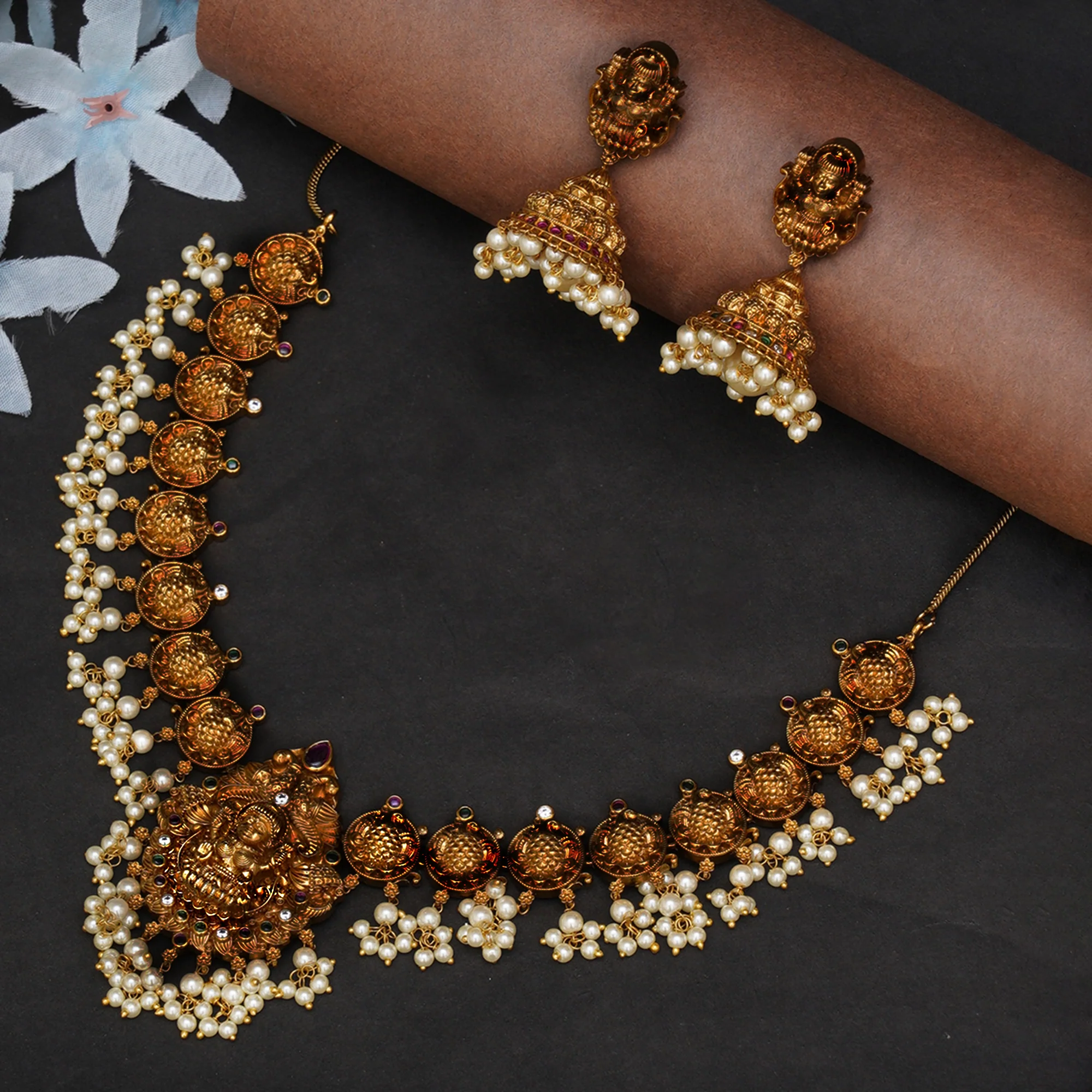 Gold Opulence Gold Plated Goddess Lakshmi Motifs Faux Pearls Lavish Jewellery Set