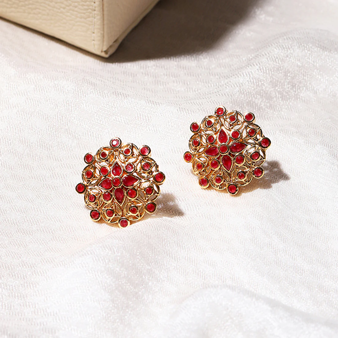 Gold Plated Round Shape Stud Earrings with Red Stone