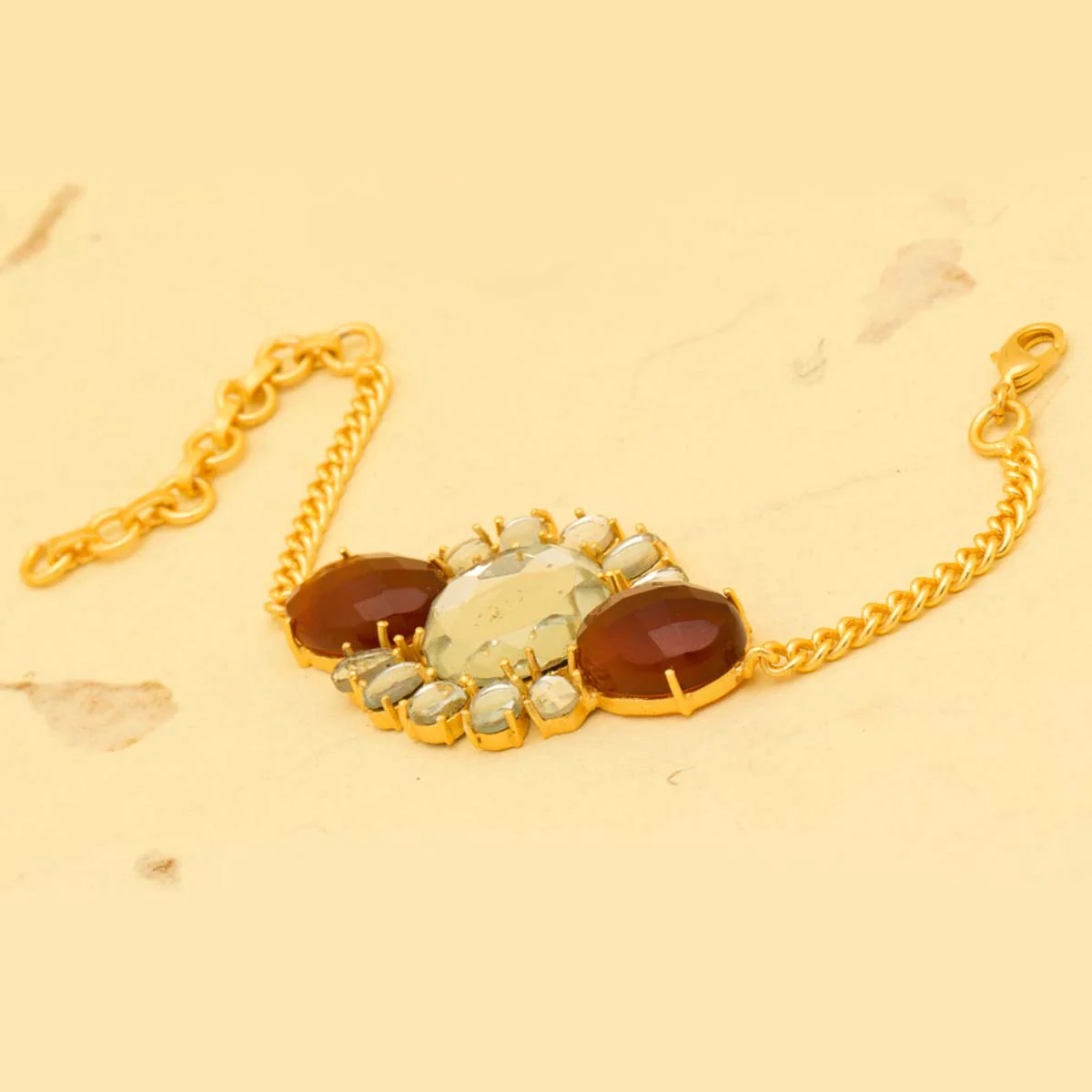 Gold Tone Link Bracelet With Glossy Floral Design