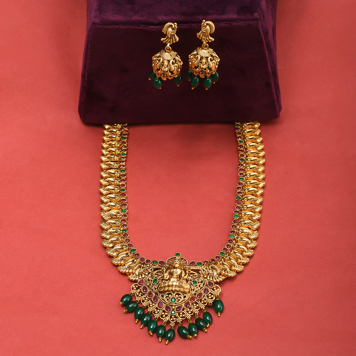Kundan and Faux Pearls Goddess Lakshmi Motif Brass Gold Plated Jewellery Set