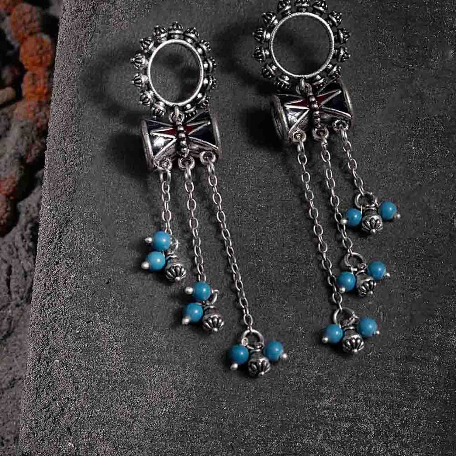 Moksh Ext Damaru Tassels Earrings