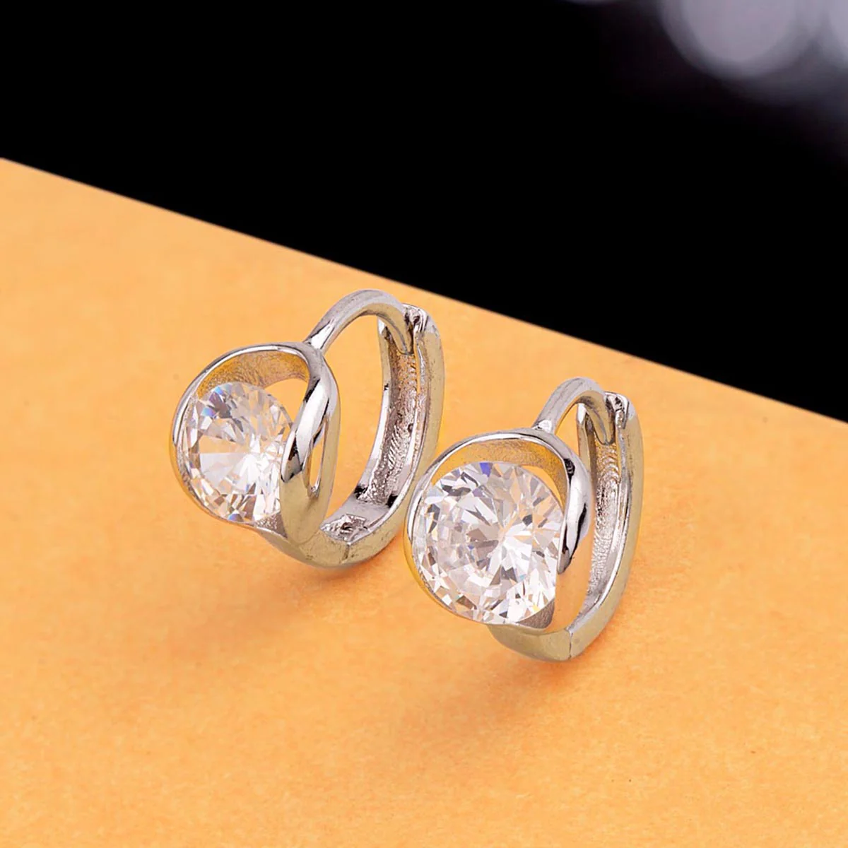 Oval Cut CZ Gem Adorned Earrings