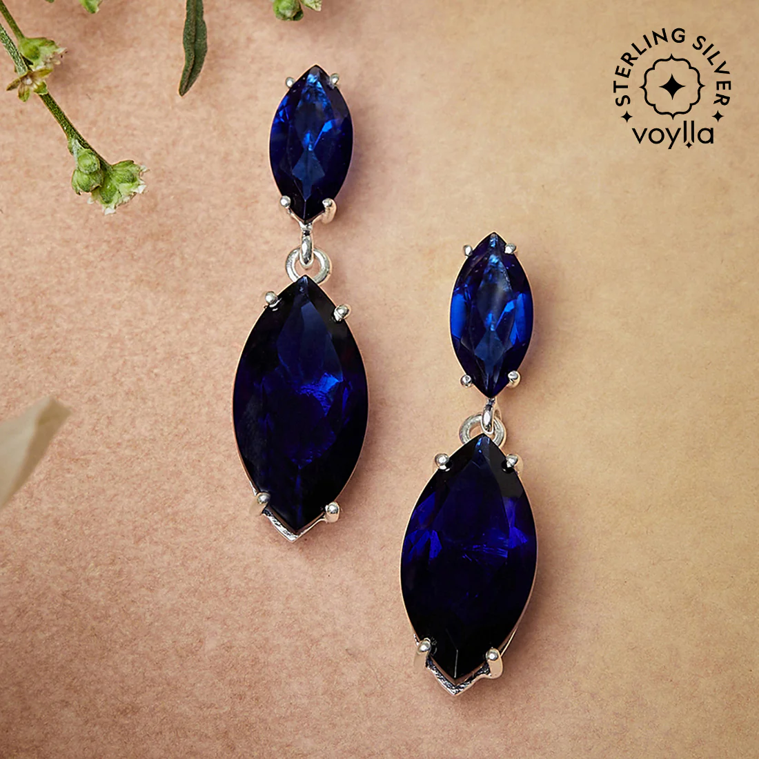 Pair Of Sterling Silver Earrings Adorn With Blue Color Stone