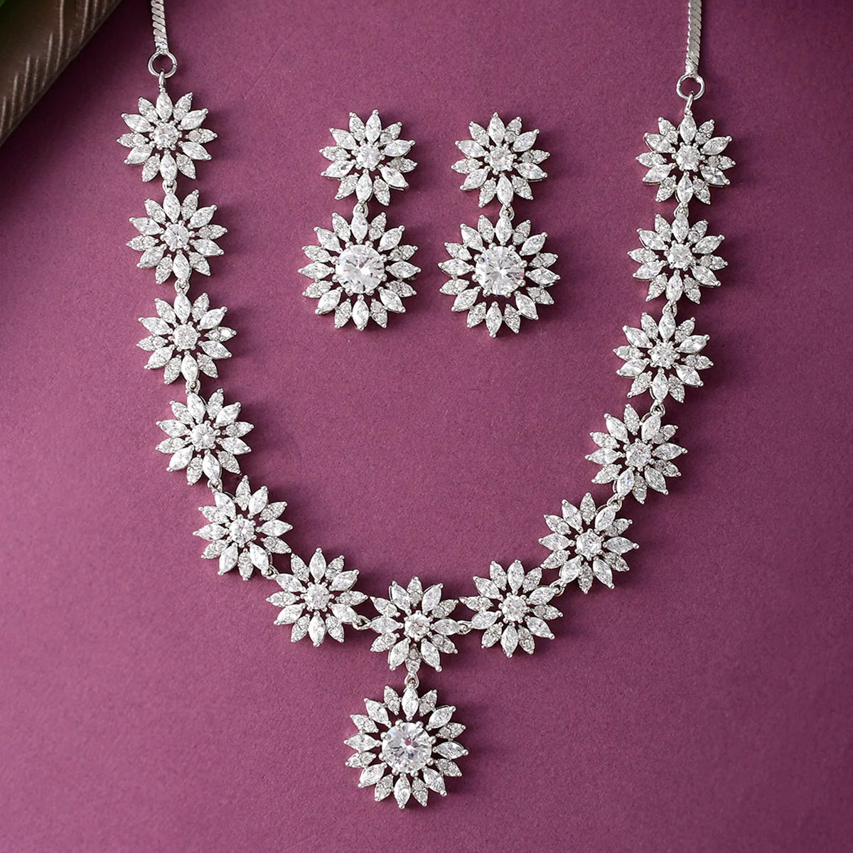 Pear Cut Zircons Adorned Floral Silver Plated Brass Jewellery Set