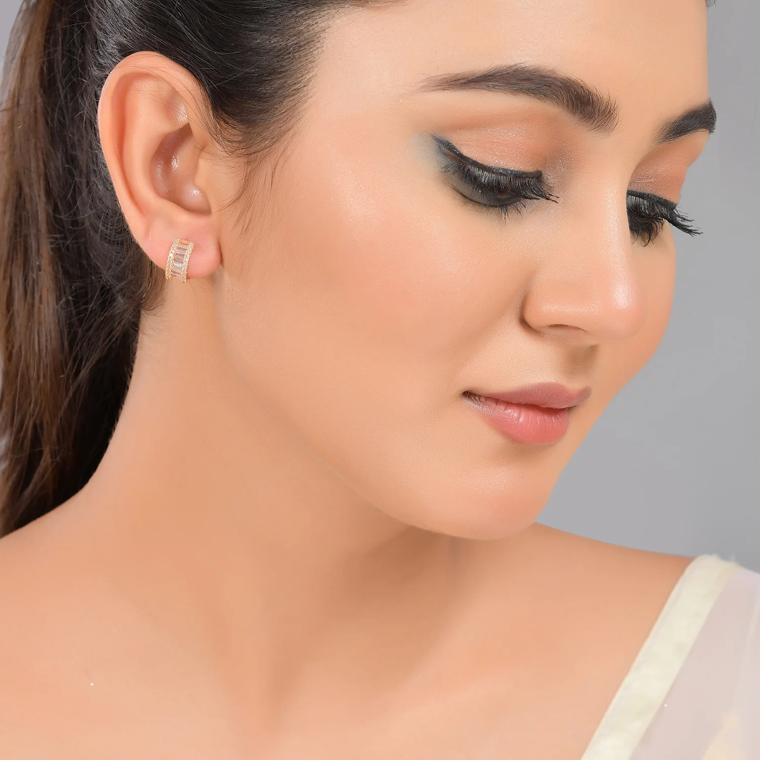 Sparkling Elegance Rectangle Cut White Cz Huggie Earrings - Image 2