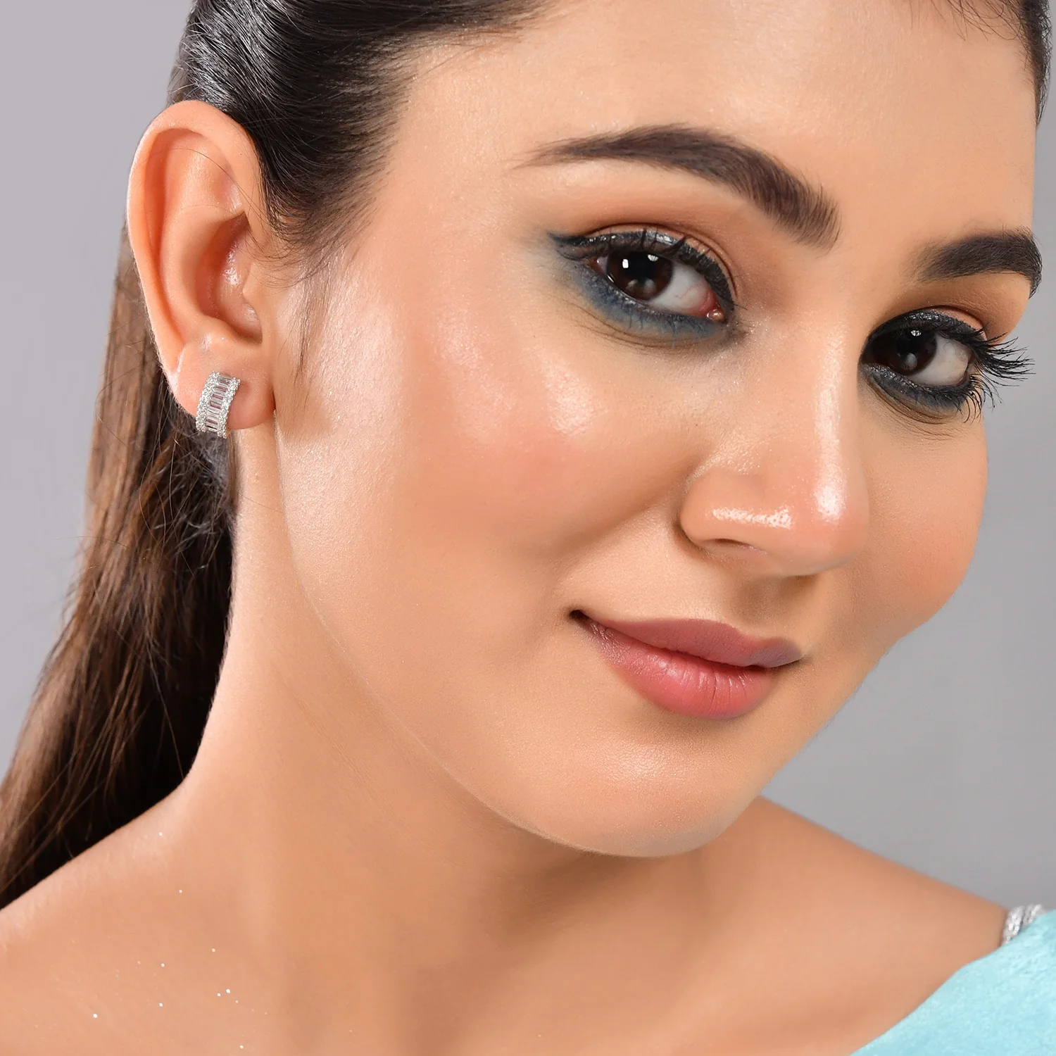 Sparkling Elegance Rectangle Cut White Cz Huggie Earrings - Image 2