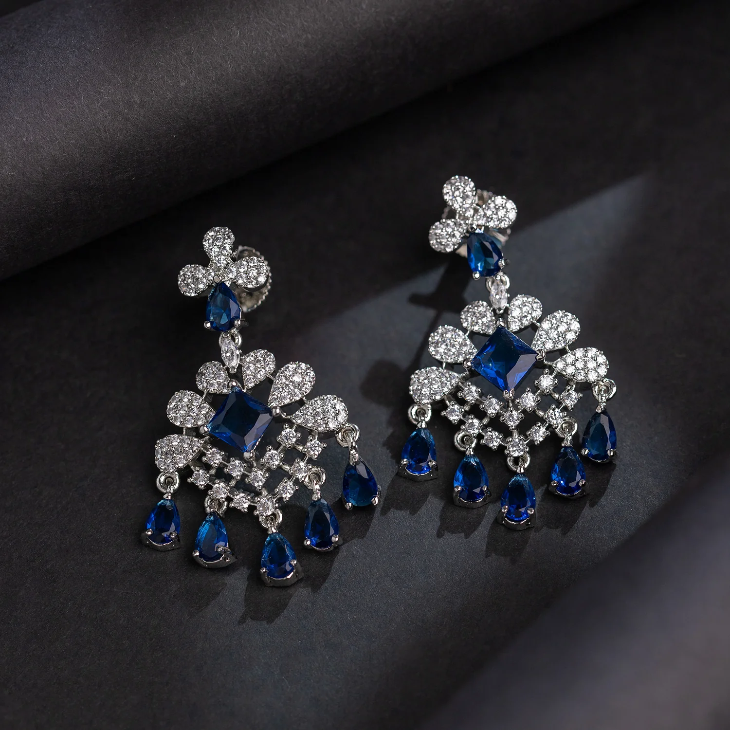 Sparkling Elegance Sapphire Glimmer American Diamond Dangler Earrings