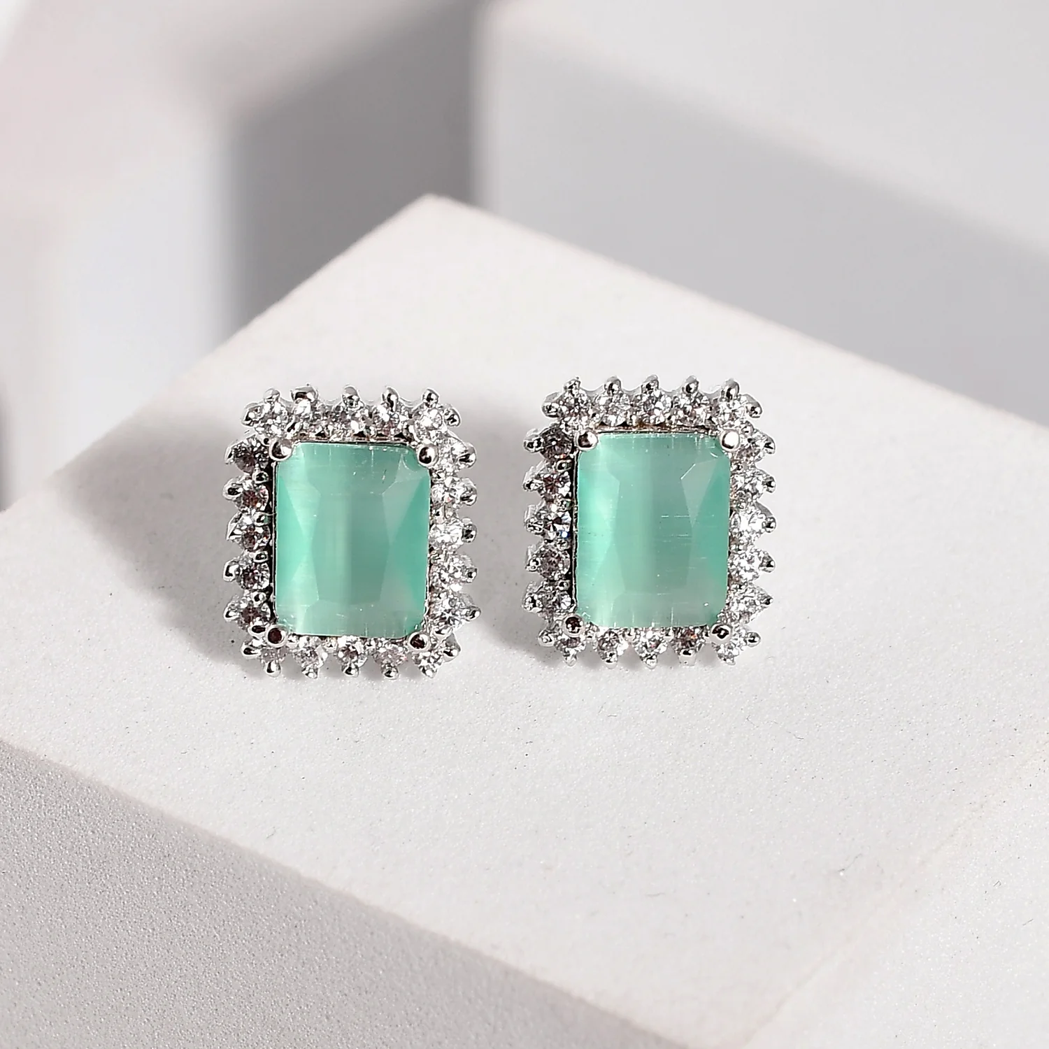 Sparkling Elegance Serene Aqua American Diamond Studs Earrings