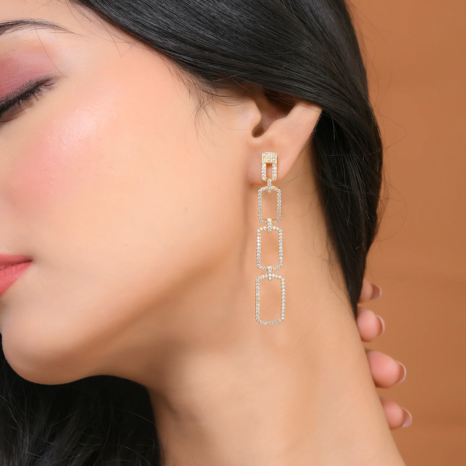 Sparkling Elegance Shimmering Chic American Diamond Gold Dangler Earrings - Image 2