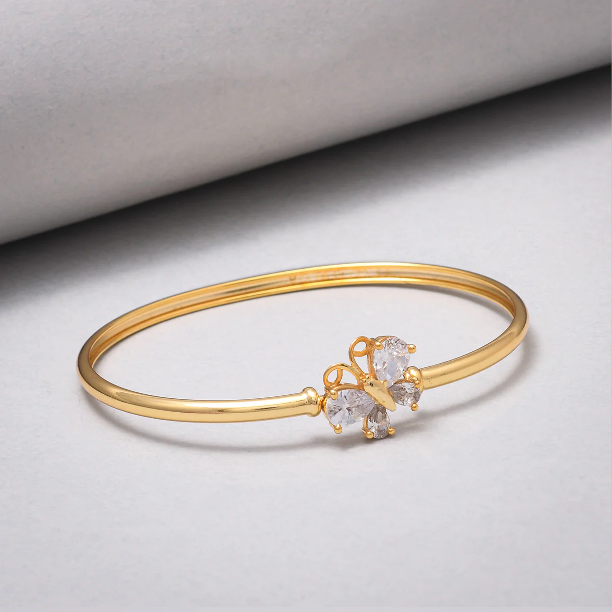 Sparkling Elegance Teardrop Cut CZ Butterfly Motif Brass Gold Plated Bracelet