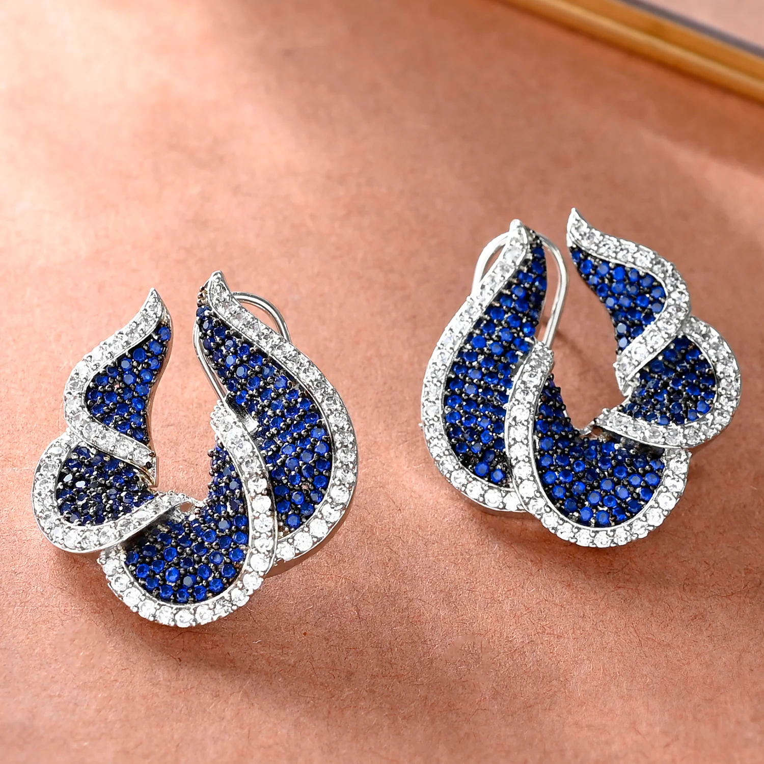 Sparkling Elegance Timeless Blue Curves American Diamond Stud Earrings