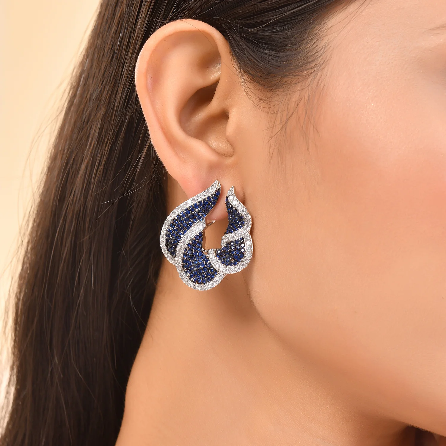 Sparkling Elegance Timeless Blue Curves American Diamond Stud Earrings - Image 2