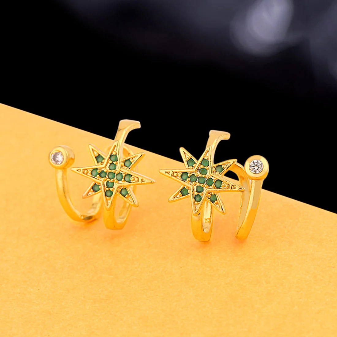 Star Motif Twist Earrings
