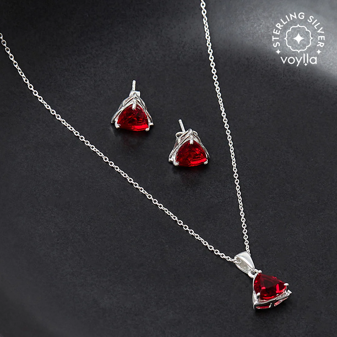 Sterling Silver Pendant Set Glittering with Red Stones