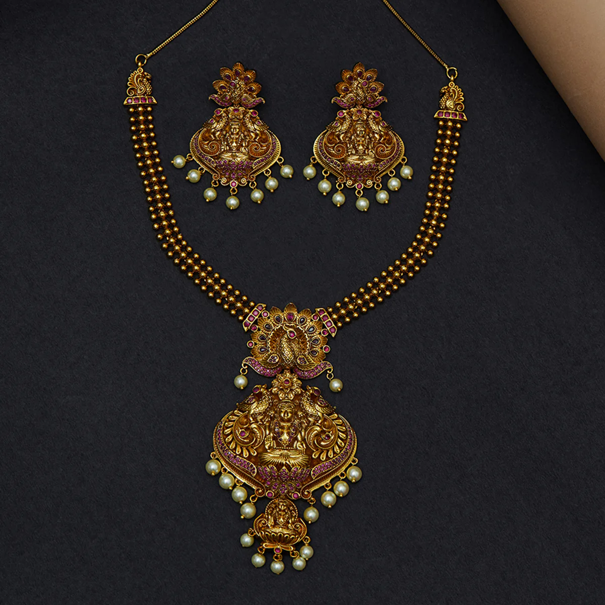 White Faux Pearls Adorned Temple Design Brass Gold Plated Jewellery Set
