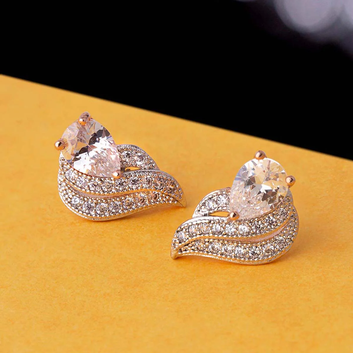 Zircons Embellished Brass Earrings